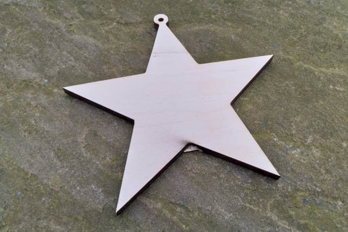 laser cut star with knot